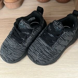 Size is us 5K ; my sons feet is getting bigger, doesnt fot him anymore.